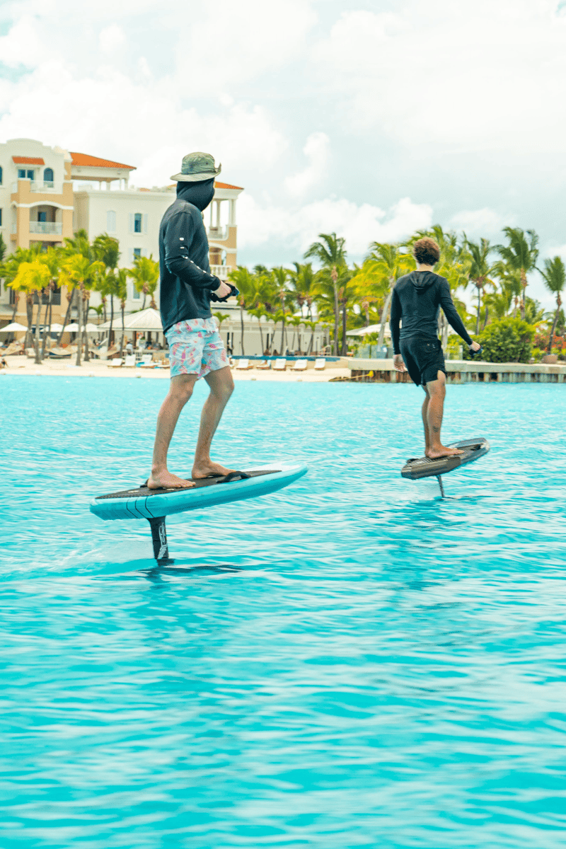 Efoil Riders In Grace Bay Turks and Caicos For A Watersports Rental Experience
